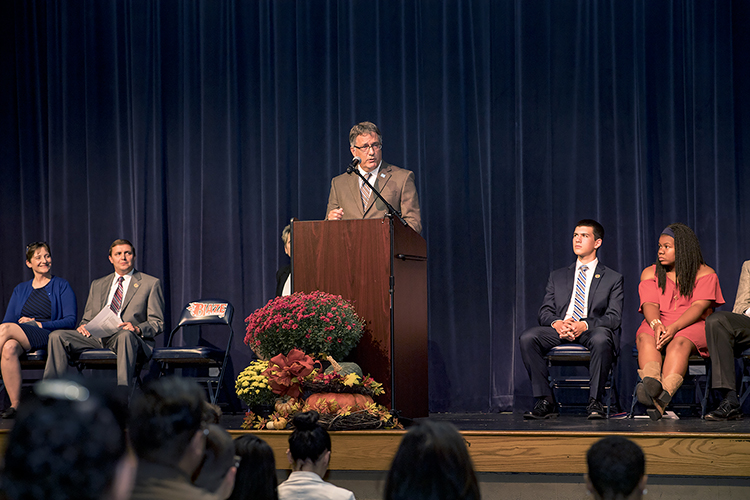 MTSU University Provost Mark Byrnes gives keynote remarks during the third annual Blackman Collegiate Academy Pinning Ceremony held Tuesday, Oct. 10, in the Blackman High School Auditorium. (MTSU photo by Kimi Conro)