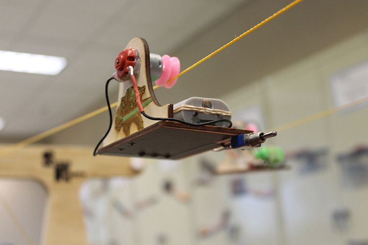 A string race vehicle made by Valerie Hackworth, assistant manager of public technology at MTSU's James E. Walker Library, is poised for a prototype string race this summer. Similar vehicles made in the library’s Makerspace area will compete in the first official String Race Tuesday, Oct. 24. (Photo courtesy of James E. Walker Library)