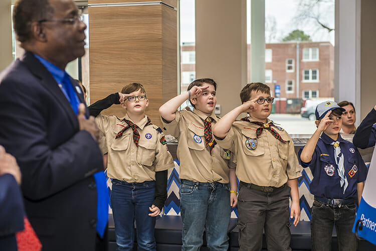 Cub Scouts from Scales and Rockvale elementary schools recite the Pledge of Allegiance Wednesday, March 7, before the signing of an agreement between MTSU and the Middle Tennessee Council of the Boy Scouts of America allowing the university to be a greater resource for scouting programs, particularly in science and technology. At left is MTSU President Sidney A. McPhee. The signing took place in the Strobel Lobby, which connects the Davis Science Building and Wiser-Patten Science Hall. (MTSU photo by Eric B. Sutton)