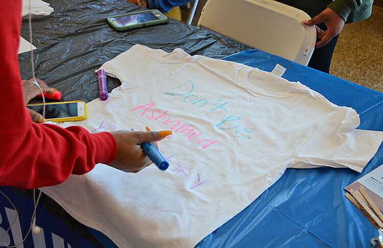 MTSU students stop by the Student Union atrium April 9 to write messages on T-shirts as part of the university’s participation in The Clothesline Project, an annual nationwide project to combat sexual assault. MTSU students can stop by the atrium from 11 a.m. to 2 p.m. through April 12. (MTSU photo by Jimmy Hart)