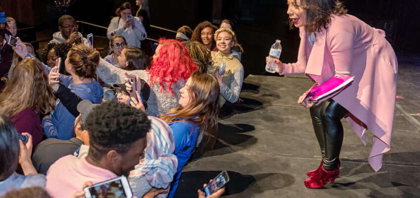 At right, MTSU Women's History Month keynote speaker Selenis Leyva, one of the breakout stars of Netflix’s hit series “Orange Is The New Black” squats down to accommodate student selfies following her remarks April 9 inside MTSU’s Tucker Theatre. (MTSU photo by J. Intintoli)