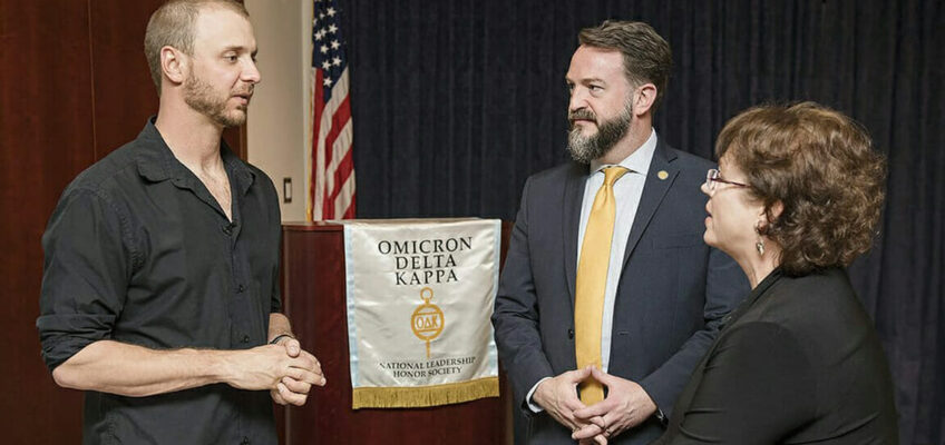MTSU alumnus Jason Kuhn, left a leadership consultant for Stonewall Solutions as well as a former Navy SEAL and MTSU baseball player, speaks with Dr. Philip Phillips, center, associate dean of the MTSU University Honors College, and Susan Lyons, Honors College coordinator and Omicron Delta Kappa campus coordinator, during the April 6 ODK True Blue Leadership Day at the Honors College. Kuhn was a guest speaker. (MTSU photo by Andy Heidt)