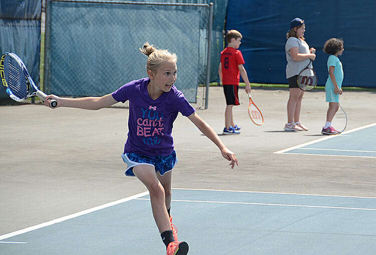 A young tennis player prepares to swing during the Wilson Collegiate Tennis Camps being hosted this summer at MTSU. (MTSU photo by Keundrea Simpson)