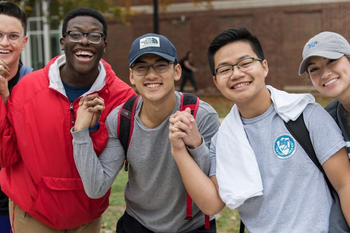 Students holding hands at the 