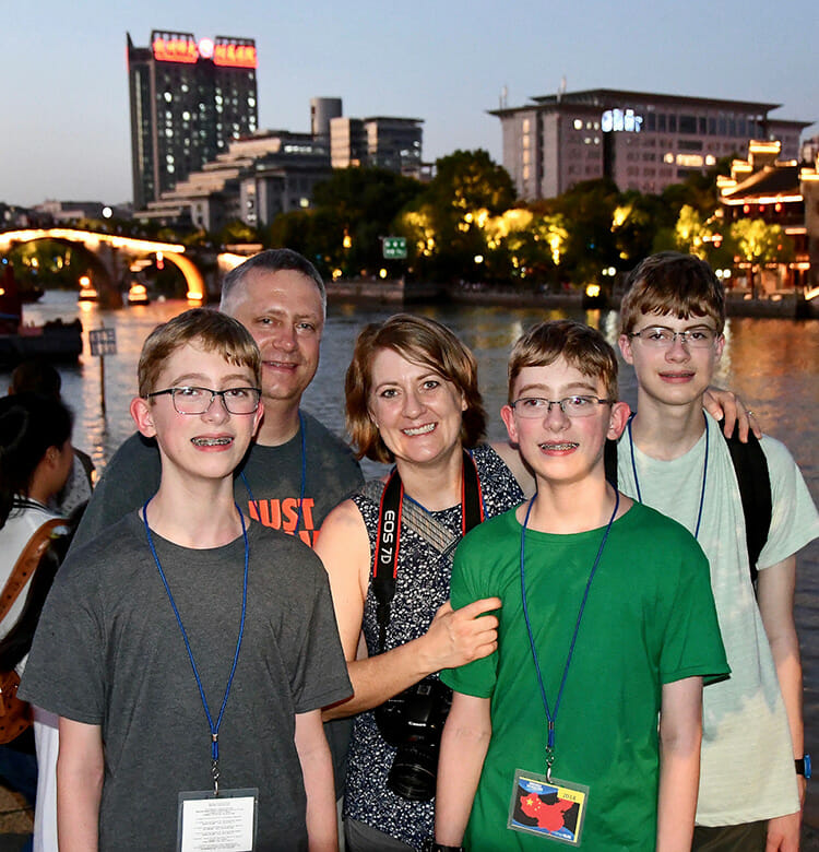 Members of the Smith family — twin sons Andrew, left, and Matthew, middle, older brother Issac, mom Jennifer and dad John — in Hangzhou, China, in July. (MTSU photo by Andrew Oppmann)