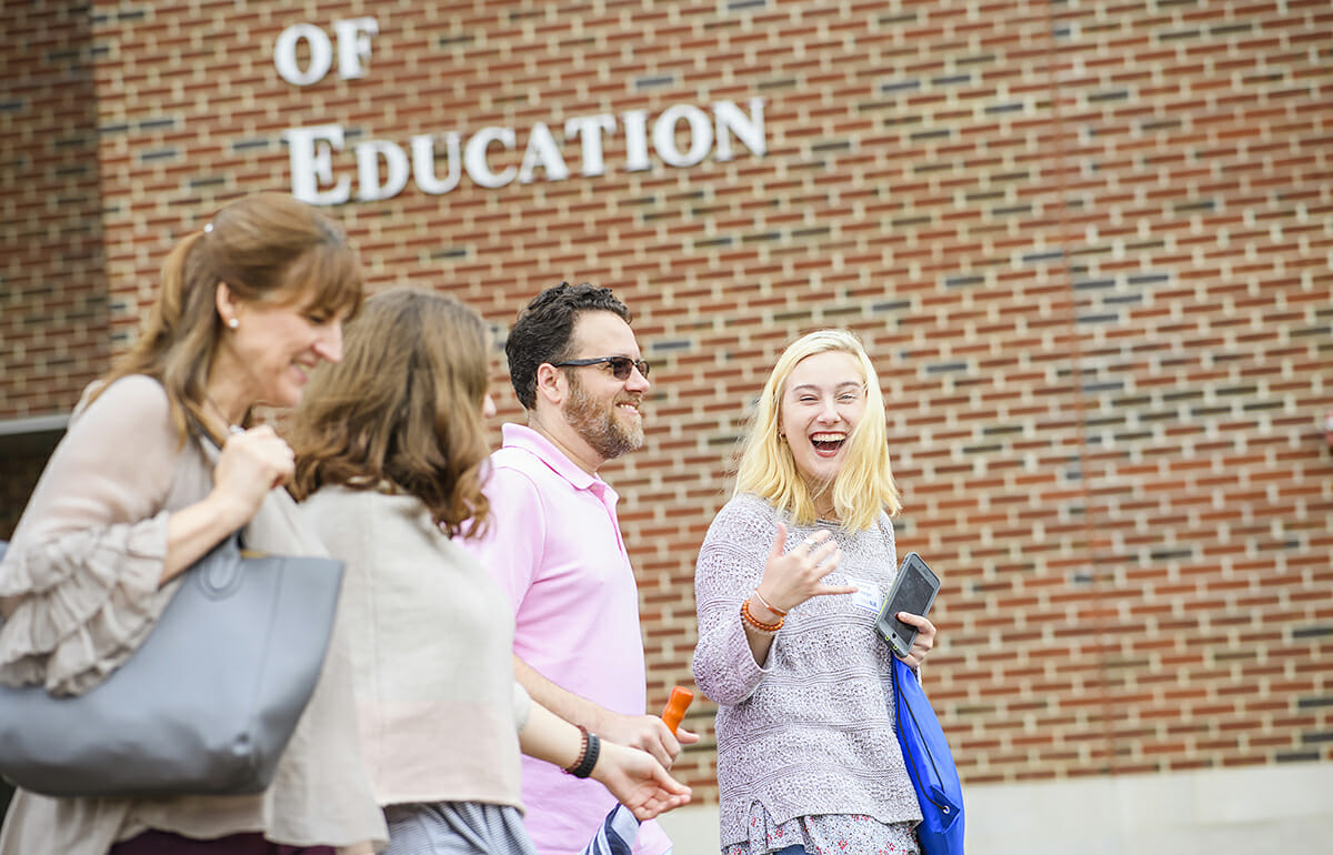 Prospective students and guests walk across the MTSU campus.