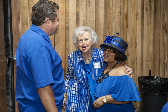 One of MTSU’s most loyal alumni, Dr. Liz Rhea proudly displays hwe “I AM true BLUE” sign during a university Capital Campaign luncheon. The Murfreesboro resident and Eagleville, Tenn., native died Thursday, May 30. (MTSU file photo by Andy Heidt)