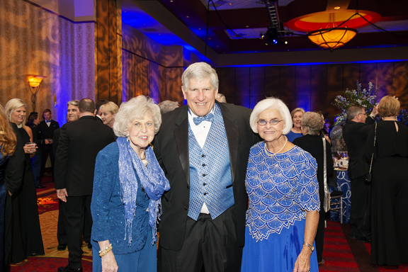 One of MTSU’s most loyal alumni, Dr. Liz Rhea proudly displays hwe “I AM true BLUE” sign during a university Capital Campaign luncheon. The Murfreesboro resident and Eagleville, Tenn., native died Thursday, May 30. (MTSU file photo by Andy Heidt)