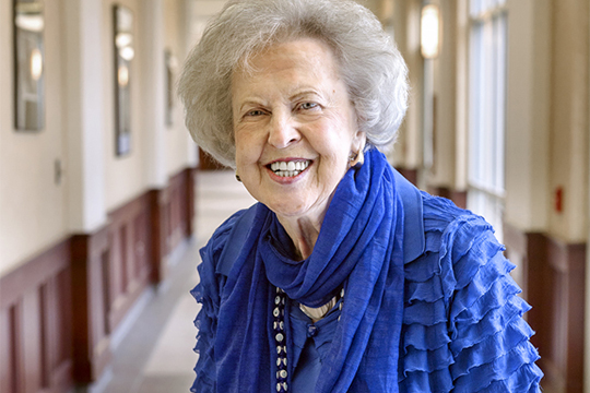 One of MTSU’s most loyal alumni, Dr. Liz Rhea proudly displays hwe “I AM true BLUE” sign during a university Capital Campaign luncheon. The Murfreesboro resident and Eagleville, Tenn., native died Thursday, May 30. (MTSU file photo by Andy Heidt)