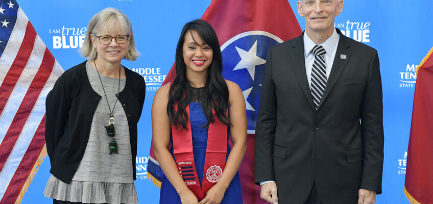 Deb Sells, left, MTSU’s vice president of Student Affairs and vice provost for Enrollment and Academic Services, Thuylinh Tran and Keith M. Huber, senior adviser for veterans and leadership initiatives and a retired U.S. Army lieutenant general, are pictured during the formal Graduating Veterans Stole Ceremony in early August in the Miller Education Center atrium and hosted by the Charlie and Hazel Daniels Veterans and Military Family Center. (MTSU file photo by Andy Heidt)