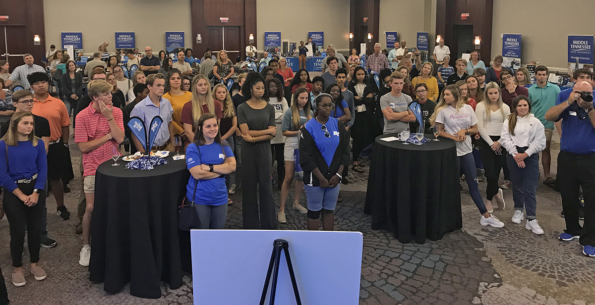 The crowd attending the MTSU True Blue Tour event in Huntsville, Ala., Wednesday, Sept. 25, listens as university President Sidney A. McPhee shares news about a new guaranteed $8,000 scholarship for students with a 23 or 24 ACT and 3.5 or higher GPA. (MTSU photo by Randy Weiler)
