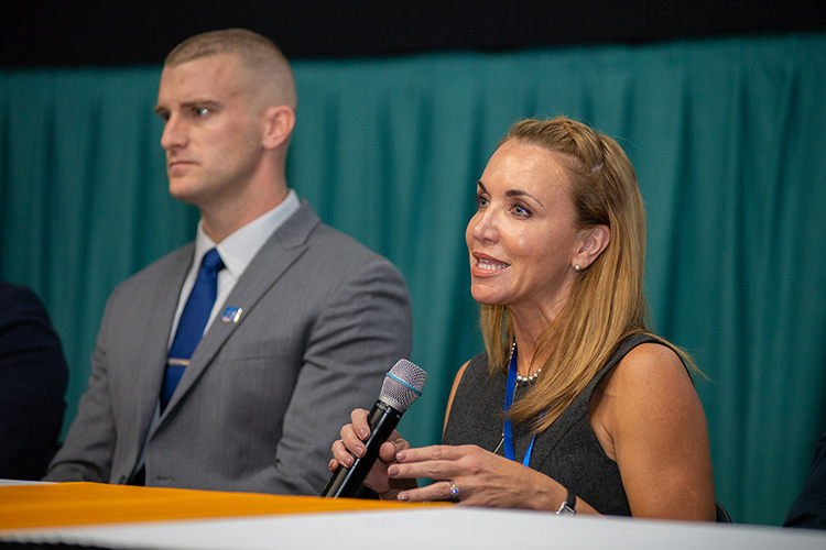 Hilary Miller, right, director of MTSU’s Charlie and Hazel Daniels Veterans and Military Family Center, participates in a panel discussion Thursday, Oct. 10, at Regal Hollywood 27 following the screening of “Homemade,” a documentary about the post-deployment struggles of a military veteran that was shown at the Nashville Film Festival. At left is MTSU doctoral candidate and Marine veteran Corbitt Huseth. (MTSU photo by James Cessna)