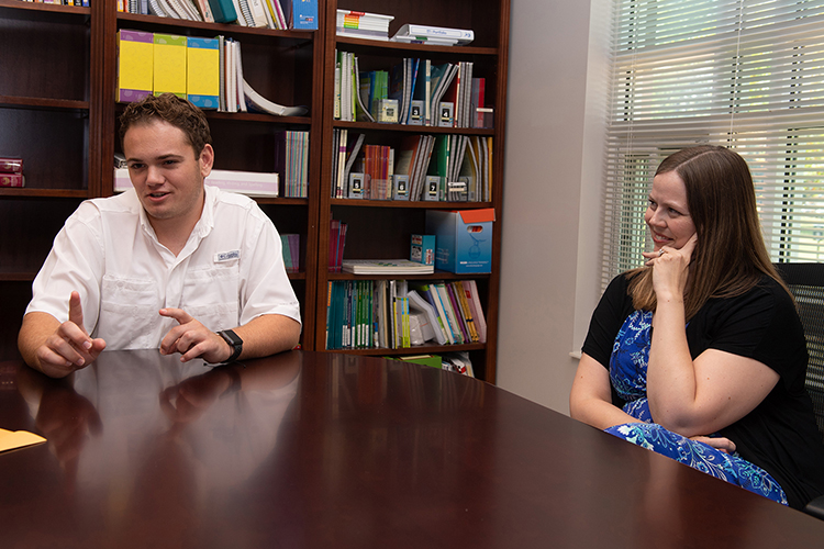Aaron Lile, left, and Erin Alexander, assistant director for clinical services at the Tennessee Center for the Study and Treatment of Dyslexia (MTSU photo by James Cessna)