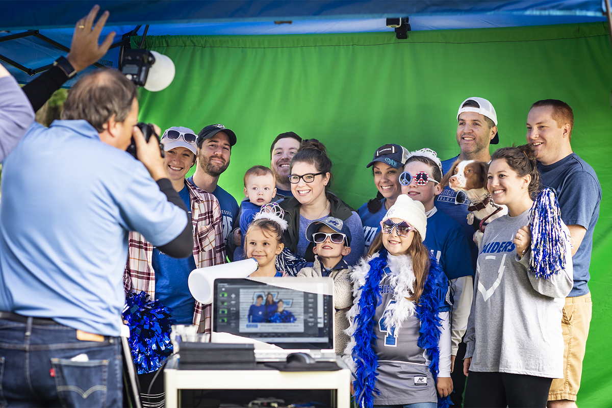 A "True Blue" group poses for a photo at the "Mixer on Main" event during the 2018 MTSU homecoming parade near East Main Street. This year, the parade route returns to Middle Tennessee Boulevard, and the "Mixer on Middle" will be held at the Alumni House, 2259 Middle Tennessee Blvd. (MTSU file photo by Kimi Conro)