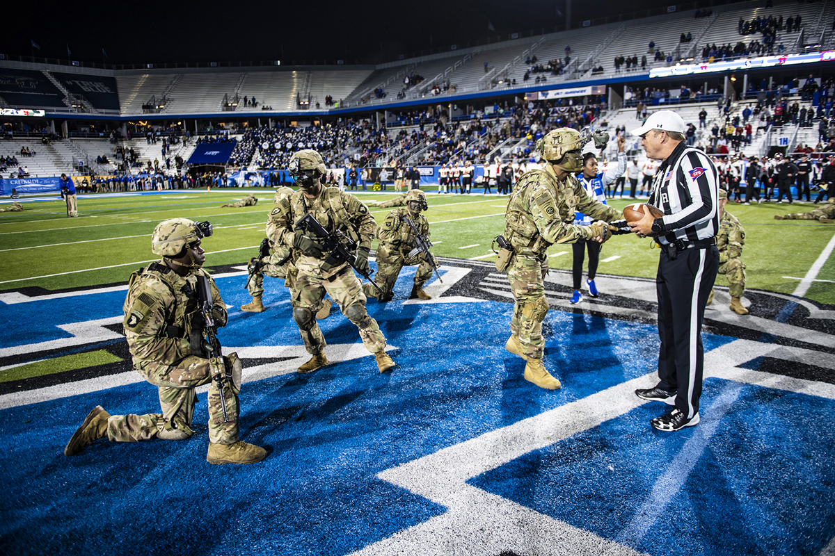 Soldiers from the U.S. Army’s Fort Campbell installation delivered the game ball to officials on the field in November 2018 during the 37th annual Salute to Veterans and Armed Forces game. Twenty-two soldiers flew by helicopter, which landed on the football practice field. (MTSU file photo by Eric Sutton)