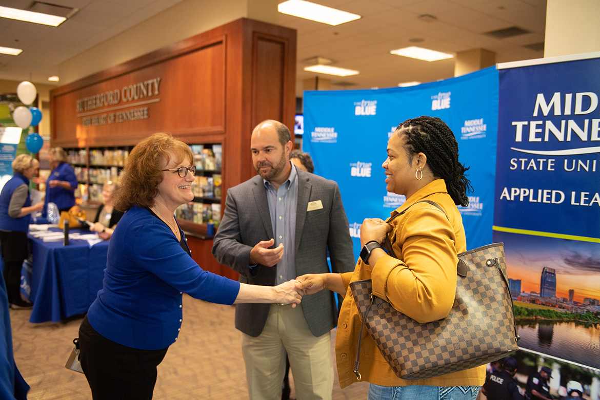 University College open house for adults to gain information to finish their degree.