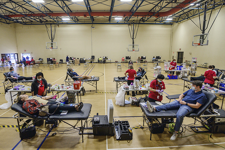 American Red Cross personnel help donors give blood at MTSU’s three-day “Bleed Blue to Beat the COVID-19 Blues” blood drive, held Sept. 28-30 at the neighboring North Boulevard Church of Christ gymnasium. Supporters donated 269 units of blood during the event, potentially helping up to 765 more people across Tennessee and parts of Kentucky, Illinois and Missouri. (MTSU photo by Andy Heidt)