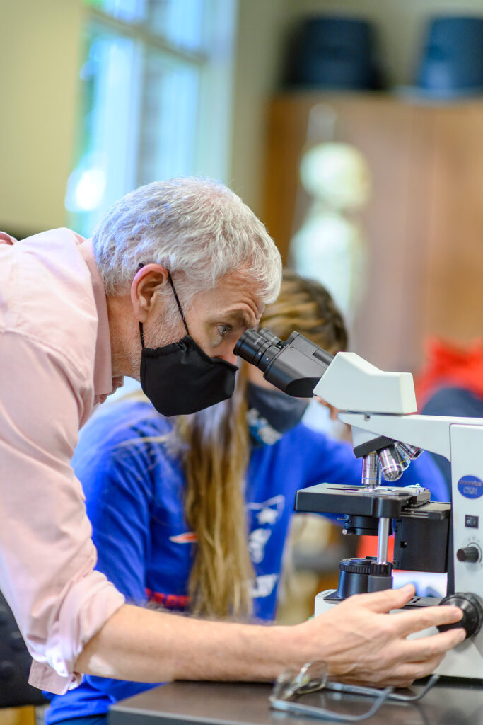 Dennis Mullen, Honors Biology faculty portrait in the Honors Science Lab.