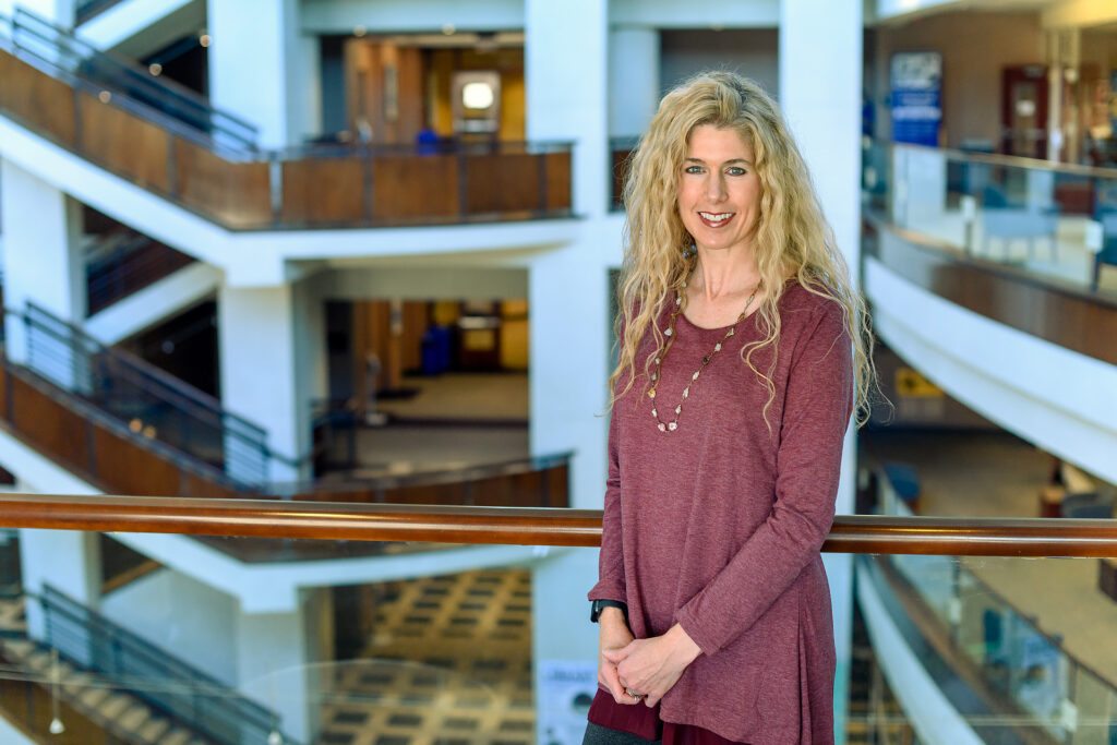 Profile portraits for Christy Groves, Interim Associate Dean for the Walker Library. (Photo: J. Intintoli)