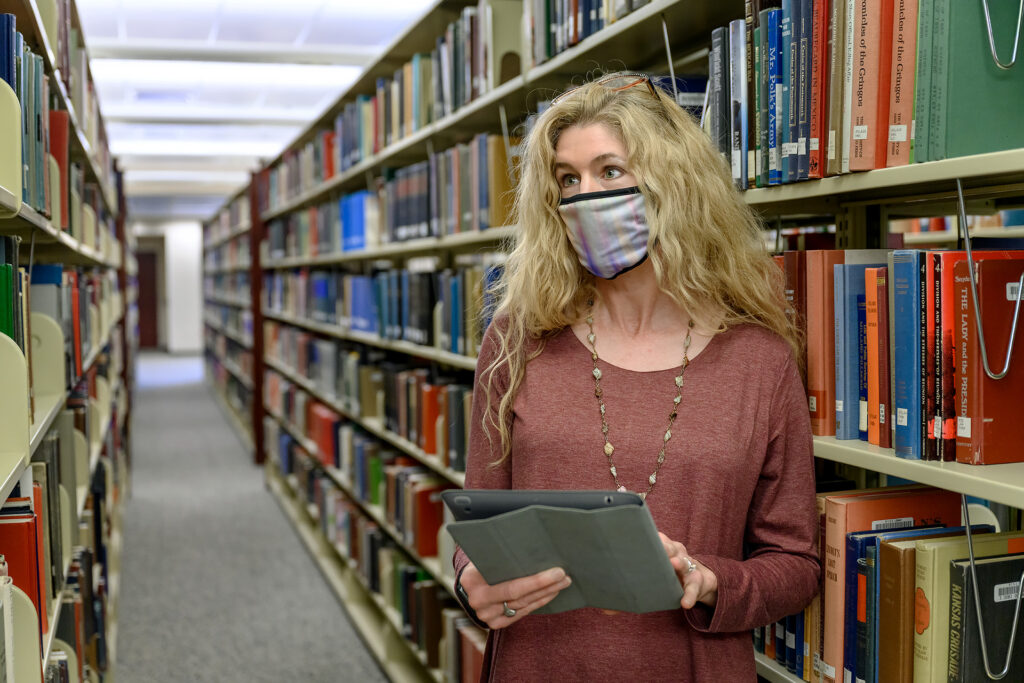 Profile portraits for Christy Groves, Interim Associate Dean for the Walker Library. (Photo: J. Intintoli)