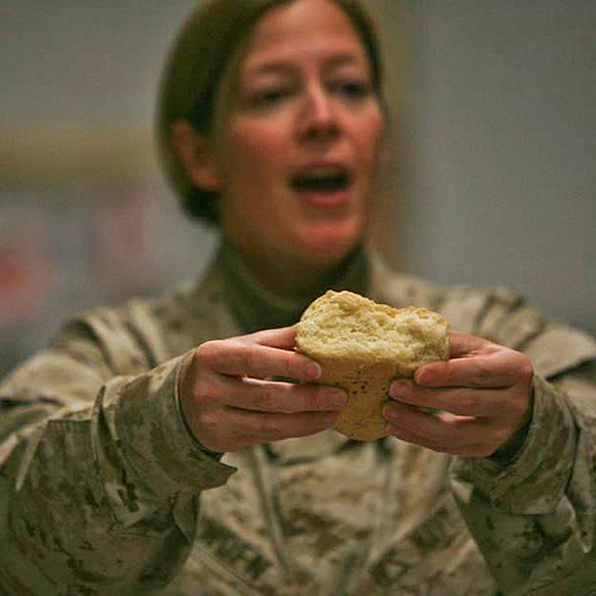 Jennifer Bowden (Class of 1994) is a Navy chaplain, currently serving with the Coast Guard in New Orleans, La. She also served a tour with the Marines in Iraq, where, in this photo, she was serving Christmas communion at the front lines. (Submitted photo)