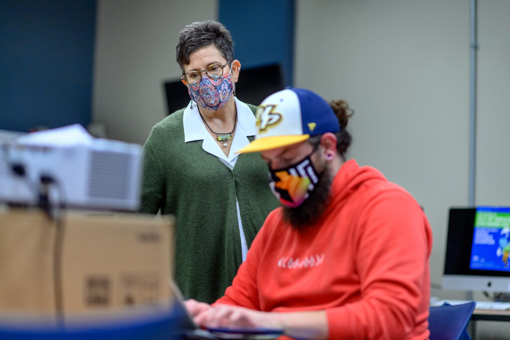 Leslie Haines, School of Journalism and Strategic Media faculty profile at Bragg Media and Entertainment building. (Photo: J. Intintoli)