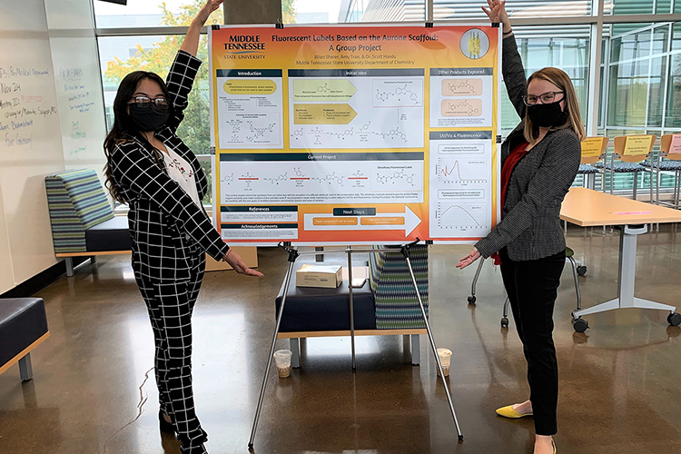 Middle Tennessee State University Undergraduate Research Experience and Creative Activity grant students Amy Tran, left, and Jillian Sherer, right, shared their research project at the Undergraduate Research Open House on the Murfreesboro, Tenn., campus at the Science Building mezzanine on Nov. 10, 2020. (MTSU photo by Casey Penston)