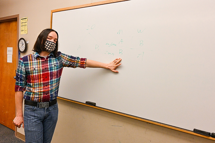 Zach Thomas, a Middle Tennessee State University math graduate student, explains how he divides his students into two groups to adhere to COVID safety guidelines as part of his work as a teaching assistant for the university while at the Kirksey Old Main building on March 10, 2021. (MTSU photo by Stephanie Barrette)