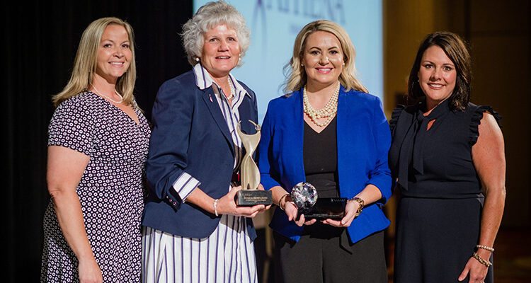 MTSU alumna Meagan Flippin, second from right, president and CEO of the United Way of Rutherford and Cannon Counties, holds her 2021 ATHENA Young Professional Leadership Award presented to her during a June 3 ceremony at Embassy Suites in Murfreesboro. Pictured, from left, are Lori Cutler, 2021 ATHENA co-chair; Patti James, 2021 Rutherford ATHENA Award recipient; Flippin; and Julie Lewis, 2021 ATHENA chair. (Photo courtesy of Rutherford CABLE)
