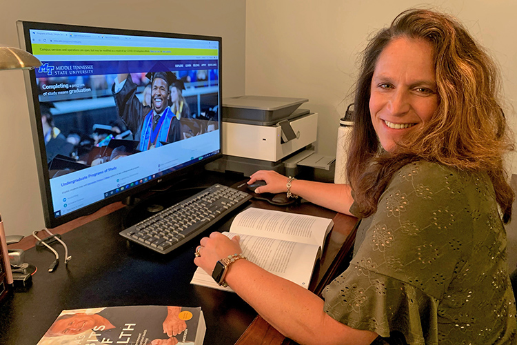 MTSU adult learner Julie Witt of Old Hickory, Tenn., takes online courses through University College from a renovated walk-in closet in her home. A mother of 11, Witt is pursuing completion of her bachelor’s degree in integrated studies after two decades away from the classroom as she and her husband raised their family. After taking advantage of the Prior Learning Assessment course, she’s on track to graduate in May 2022. (Submitted photo)
