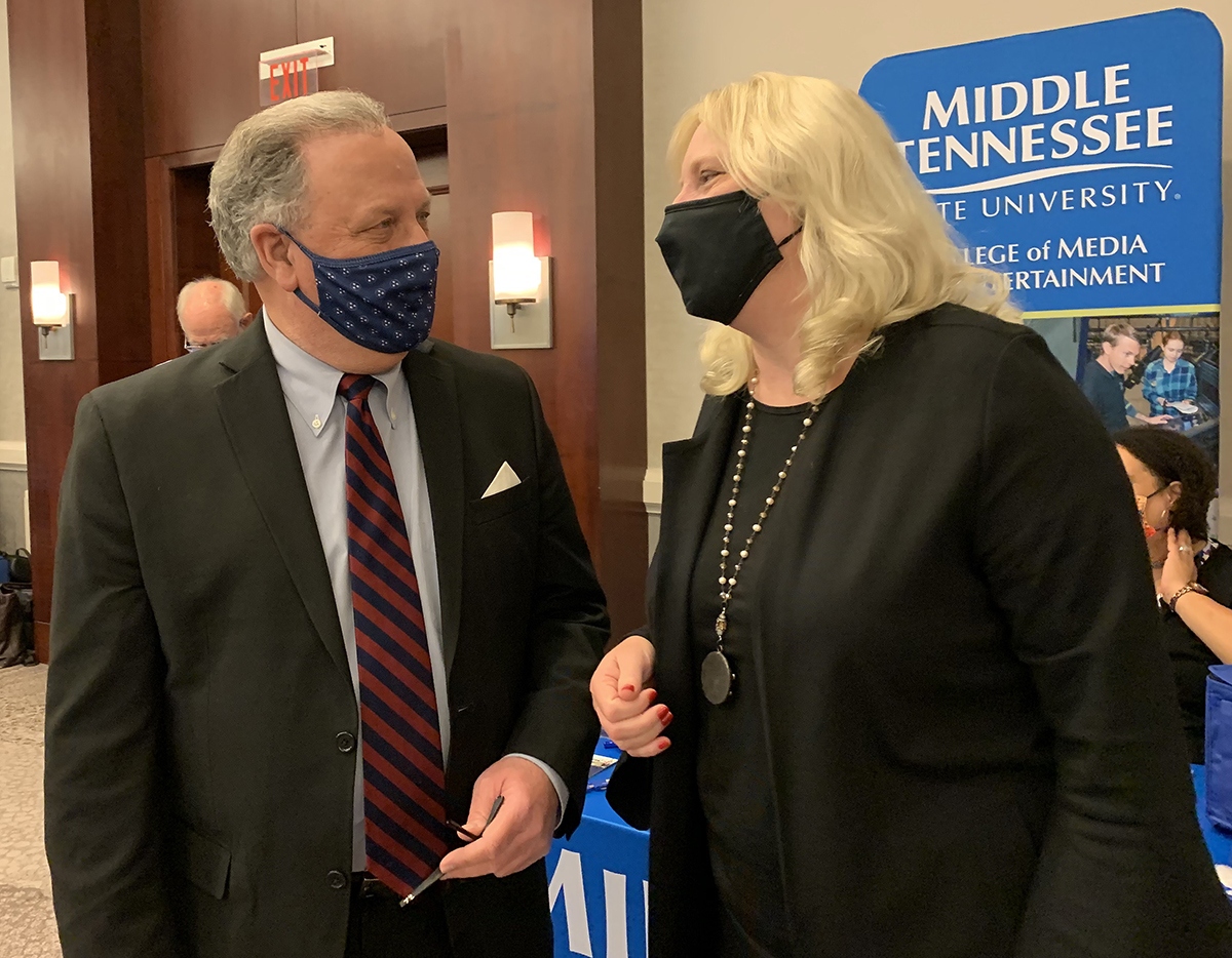 MTSU alumnus, longtime anchor/reporter and hall of fame broadcaster Jerry Hayes, left, chats with Beverly Keel, dean of the MTSU College of Media and Entertainment Tuesday, Sept. 22, at The Westin Huntsville hotel in Huntsville, Ala. Hayes has spent 41 years at WHNT-TV. (MTSU photo by Randy Weiler)
