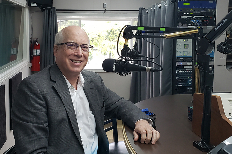 Dr. Ken Currie, chair of the Engineering Technology Department, prepares to go on air for the Monday, Sept. 20, WGNS “Action Line” program with host Scott Walker. (MTSU photo by Jimmy Hart)