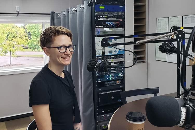 Amie Whittemore, English lecturer, new MTSU Write direcor and Murfreesboro Poet Laureate, prepares to go on air for the Monday, Sept. 20, WGNS “Action Line” program with host Scott Walker. (MTSU photo by Jimmy Hart)