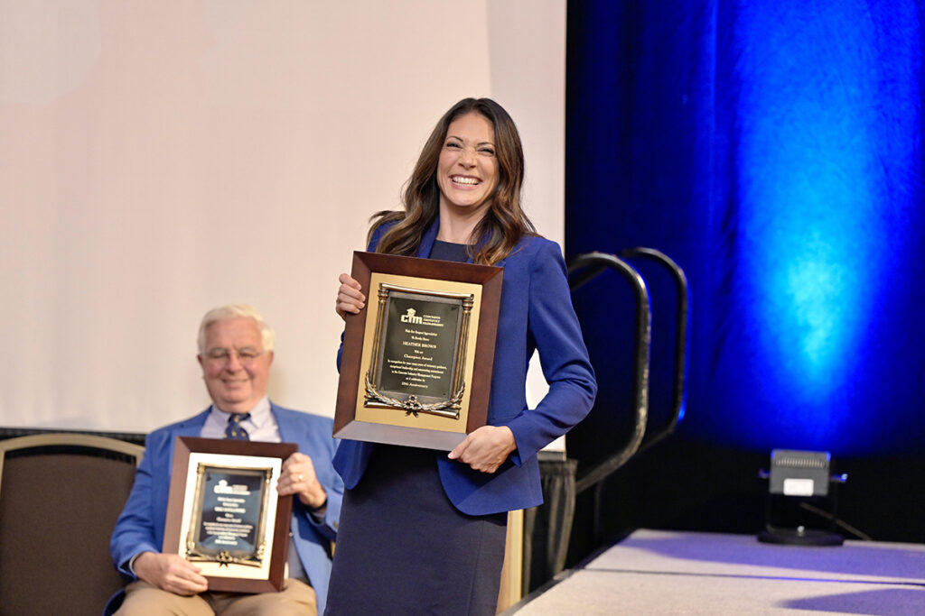 Former MTSU professor and School of Concrete and Construction Management Director Heather Brown holds the Concrete Industry Management National Steering Committee Champion Award she received Tuesday, Oct. 26, during the 25th Anniversary for CIM, held at Embassy Suites Hotel Nashville SE Murfreesboro. Brown, who joined IMI as a vice president of quality control and quality assurance, received other awards and praise for her outstanding career at MTSU. She remains an adjunct faculty in the CIM Executive MBA program. (MTSU photo by Andy Heidt
