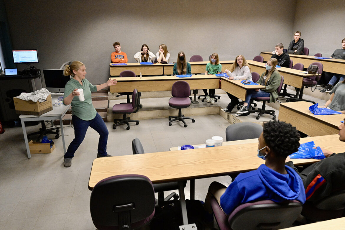 Katie Foss, professor in journalism and strategic media in the MTSU College of Media and Entertainment, engages Blackman Collegiate Academy sophomores in conversation about social media Thursday, March 17, in the John Bragg Media and Entertainment Building. The BCA students heard from a variety of faculty, staff, students and administrators during their visit. (MTSU photo by Andy Heidt)