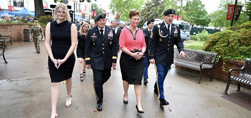 Alexis Huber, left, walks with her parents, Army LTG(R) Keith Huber and Shelly Huber, along with U.S. Army Reserve Command Sgt. Maj. Andrew Lombardo Tuesday, May 24, as they head to the Grand Ole Opry House in Nashville, Tenn. They attended the Opry’s annual Salute to Troops show. (MTSU photo by James Cessna)