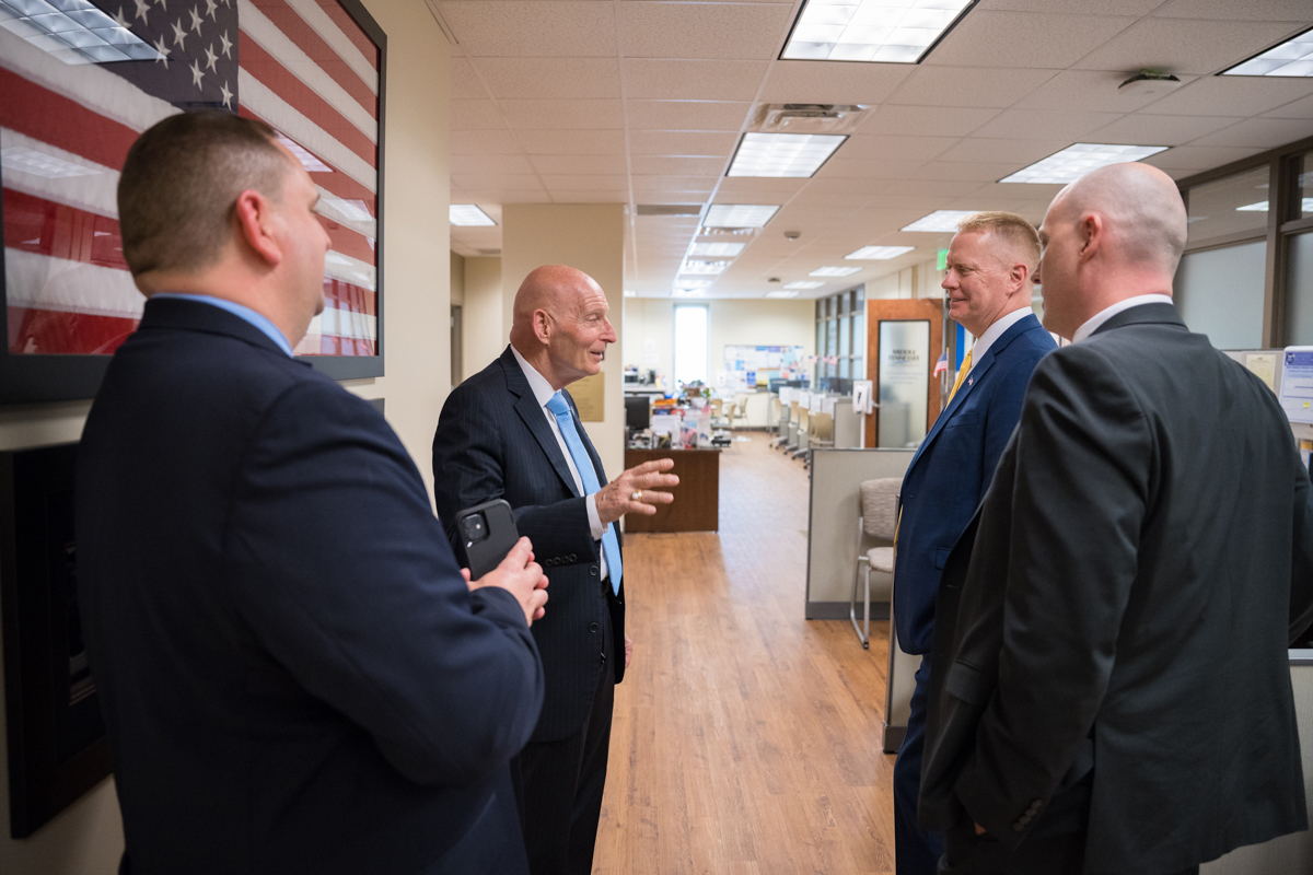 Keith M. Huber, second from left, senior adviser for veterans and leadership initiatives at MTSU, provides an overview of the university’s Charlie and Hazel Daniels Veterans and Military Family Center recently to visitors from the Tennessee Valley Healthcare Systems. Listening to Huber are Hunt Blair, left, Michael Renfrow and news Executive Director Daniel Dücker. (MTSU photo by James Cessna)