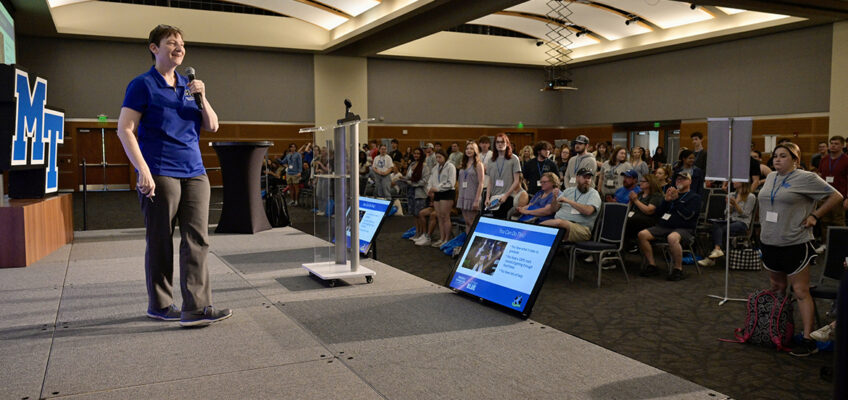 In a positive approach of telling new freshmen they have what it takes to graduate in four years, Laurie Witherow, associate vice provost for Admissions and Enrollment Services at Middle Tennessee State University, gets them to participate during a mid-May CUSTOMS orientation session in the Student Union Ballroom. Orientation takes place on campus throughout the summer for freshmen and transfer student. (MTSU photo by Andy Heidt)