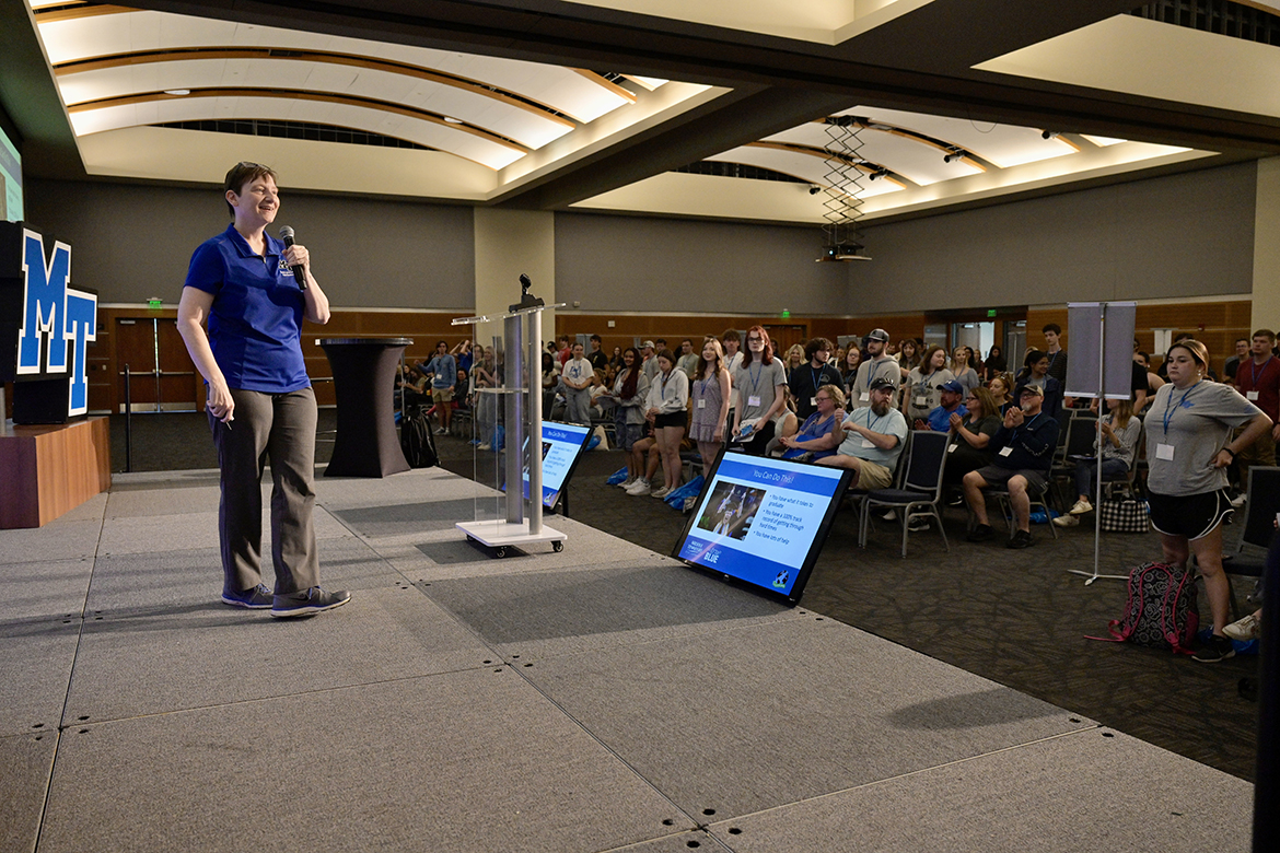 In a positive approach of telling new freshmen they have what it takes to graduate in four years, Laurie Witherow, associate vice provost for Admissions and Enrollment Services at Middle Tennessee State University, gets them to participate during a mid-May CUSTOMS orientation session in the Student Union Ballroom. Orientation takes place on campus throughout the summer for freshmen and transfer student. (MTSU photo by Andy Heidt)