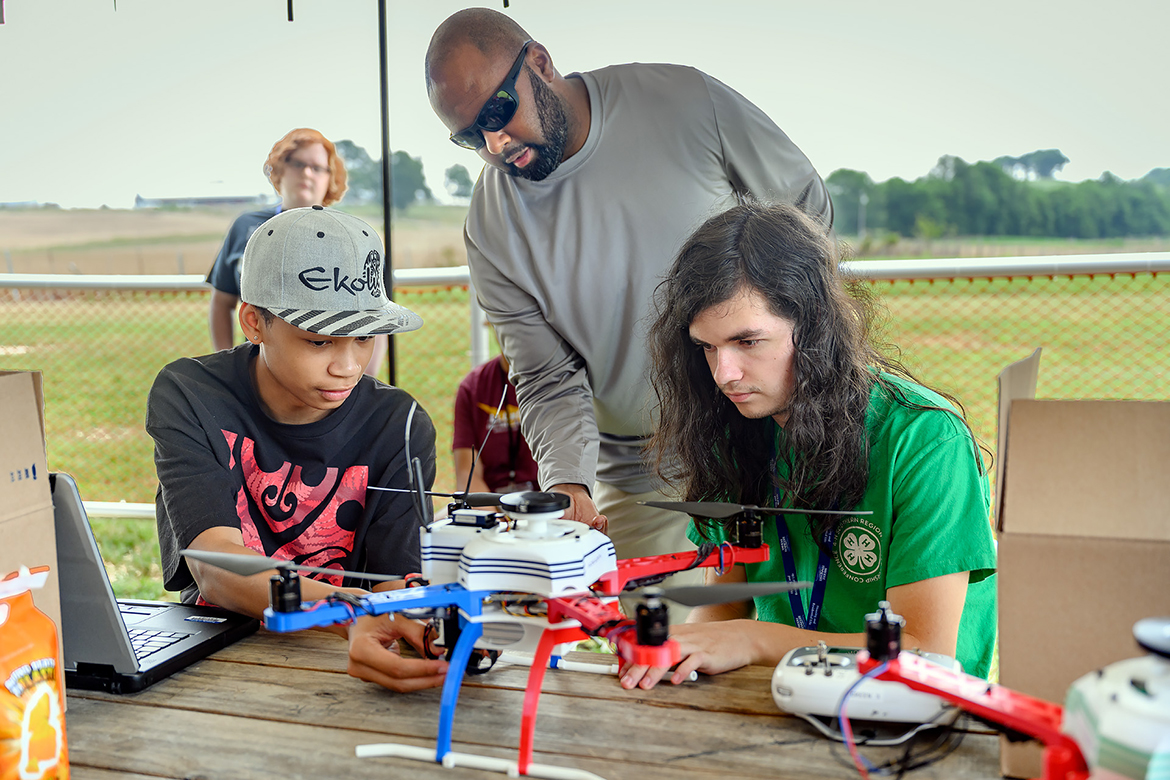 Kevin Corns, Middle Tennessee State University associate professor and director the Aerospace Department’s unmanned aircraft systems program, uses sophisticated technology to show the Digital Agriculture campers how to map locations to fly drones to collect data at the MTSU Farm in Lascassas, Tenn. Sixteen area high school students attended the nearly three-week camp. (MTSU photo by J. Intintoli)