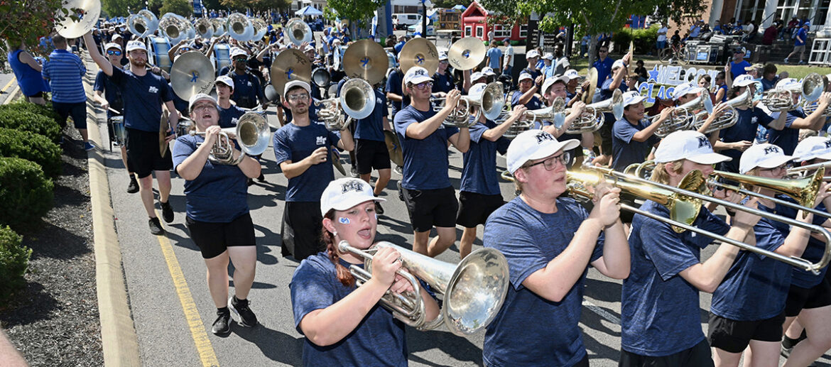 Middle Tennessee State University’s Band of Blue entertains spectators along Middle Tennessee Boulevard in Murfreesboro, Tenn., in September 2023 during the MTSU Homecoming Parade. The band again will perform Saturday, Sept. 21, at the parade, Raider Walk and throughout the game between the Blue Raiders and visiting Duke Blue Devils from the Atlantic Coast Conference. (MTSU file photo by J. Intintoli)
