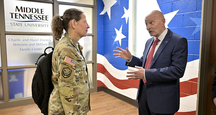 Lt. Gen. Jody Daniels, left, commanding general of the U.S. Army Reserve, chats with retired Army Lt. Gen. Keith Huber, senior adviser for veterans and leadership initiatives at Middle Tennessee State University, outside the Charlie and Hazel Daniels Veterans and Military Family Center during Daniels’ visit Tuesday, May 21, to the MTSU campus in Murfreesboro, Tenn. (MTSU photo by J. Intintoli)
