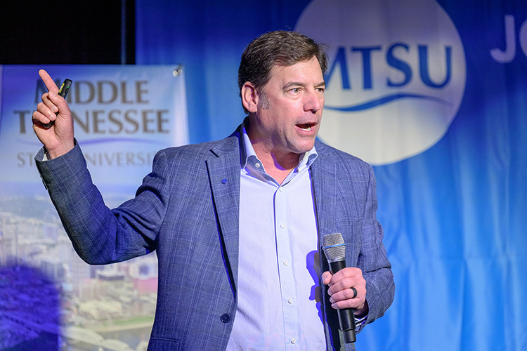 Mike Honious, president and CEO of transportation and logistics company Geodis Americas region, makes a point during his keynote remarks from the stage of the Keathley University Center Theater during the 2024 Midsouth Supply Chain Summit held April 11 at Middle Tennessee State University in Murfreesboro, Tenn. (MTSU photo by J. Intintoli)
