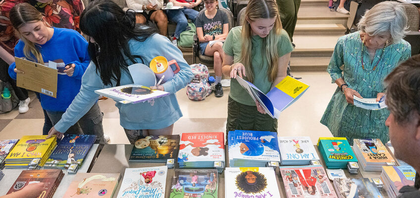 Attendees browse through the selection of free books available at the “Let Freedom READ” book banning awareness event held Wednesday, Sep. 25, at the College of Education Build-ing on the Middle Tennessee State University campus in Murfreesboro, Tenn. (MTSU pho-to by Cat Curtis Murphy)