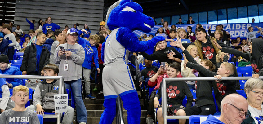 Blue Raider mascot Lightning gets youngsters from one of Murfreesboro City elementary schools fired up during the annual Education Day game Wednesday, Dec. 4, in Murphy Center on the Middle Tennessee State University campus in Murfreesboro, Tenn. (MTSU photo by Andy Heidt)