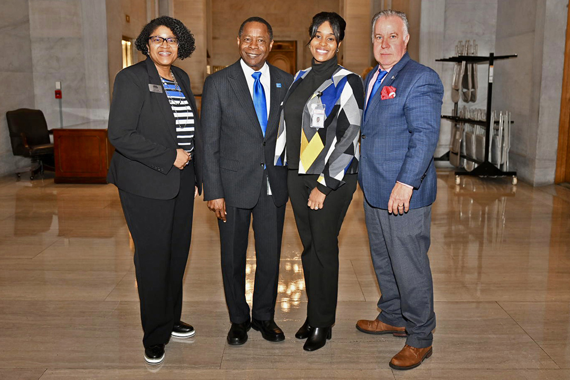 Representing Middle Tennessee State University located in Murfreesboro, Tenn., at the annual Day on the Hill luncheon held Wednesday, Feb. 12, at the Tennessee Capitol in Nashville, Tenn., are, from left, College of Liberal Arts Dean Leah Lyons, university President Sidney A. McPhee, MTSU senior and legislative intern Tiffany Parker, and state Rep. Mike Sparks, an MTSU alumnus. Parker spent the spring semester working for Sparks as part of the Tennessee Legislative Intern Program during the 114th Tennessee General Assembly session that adjourned April 22. (MTSU photo by James Cessna)