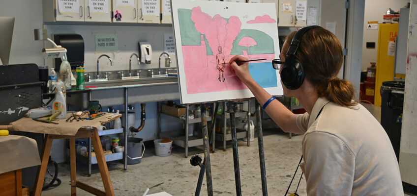 A visual arts student paints during class inside Todd Hall at the Tennessee Governor’s School for the Arts at Middle Tennessee State University. Held June 7-29, the three-week residency program allows highly talented high school juniors and seniors to improve their skills and gain college credit in their art discipline. Almost 300 students from across the state lived and attended classes this year on the MTSU campus in Murfreesboro, Tenn. (MTSU photo by Jordan Reining)