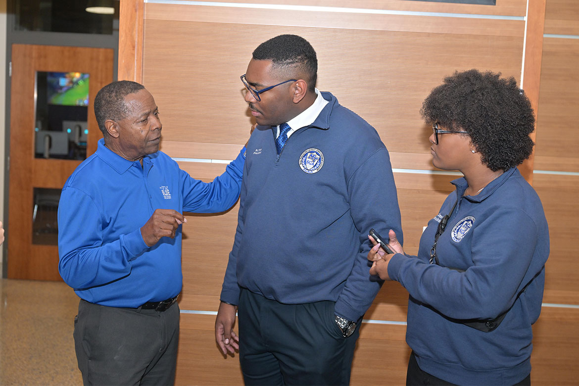 Middle Tennessee State University President Sidney A. McPhee, left, talks with MTSU Student Government Association President RJ Ware, center, and SGA Communications Director Brianna Campbell before the annual joint meeting with campus administrators held Thursday, Nov. 6, in the Parliamentary Room at the Student Union Building on campus in Murfreesboro, Tenn. (MTSU photo by James Cessna)
