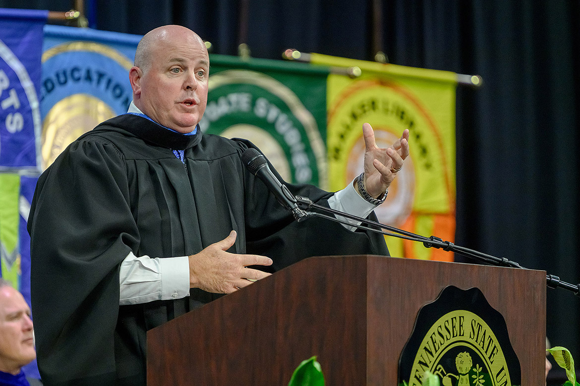 Brady Cooper, senior pastor at New Vision Baptist Church in Murfreesboro, Tenn., reminds graduates to be thankful and embrace gratitude in his keynote remarks during the Middle Tennessee State University afternoon commencement ceremony held Saturday, Dec. 13, inside Murphy Center on campus in Murfreesboro. (MTSU photo by Andy Heidt)