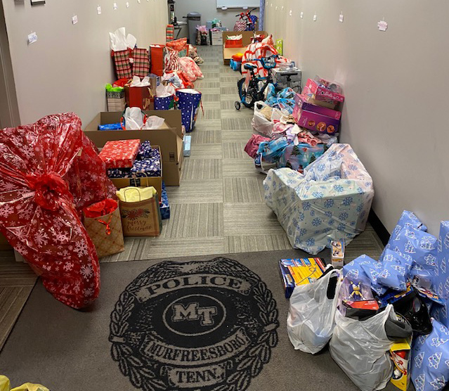 This collection of toys inside Middle Tennessee State University’s Police Department was recently distributed to area families supported by this year’s MTSU Little Raiders Gift-Giving Campaign. Secret Santas from throughout campus stepped up to brighten the holiday for area children in need. (Submitted photo)